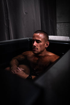 man recovering in ice bath